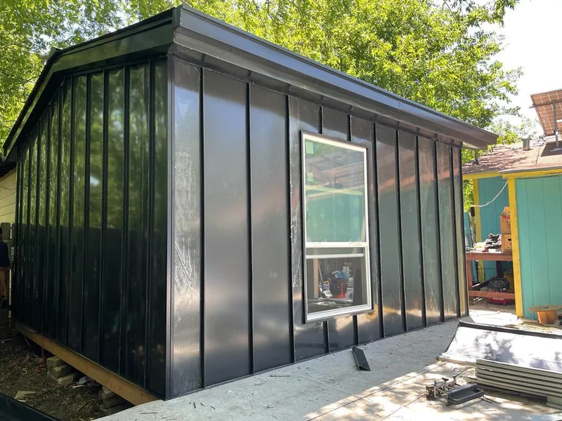 Black standing seam metal wall panels for Roof Inspection in Agoura Hills